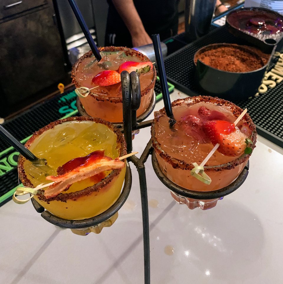 Mexican menu with fajitas and burritos.