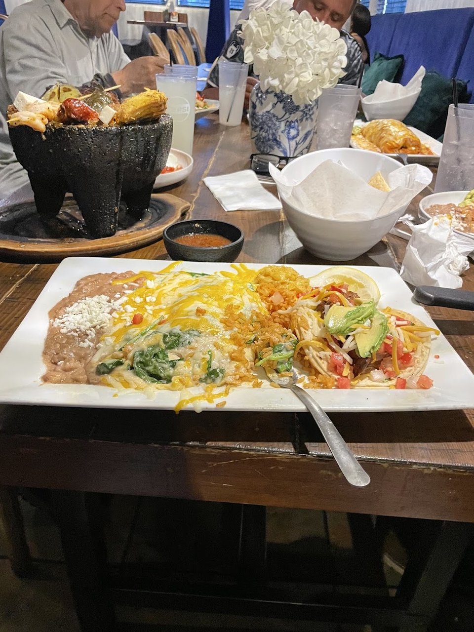 Mexican menu with fajitas and burritos.
